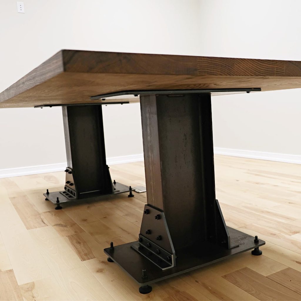 wooden table with metal bases